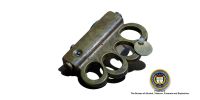Image of brass knuckles.