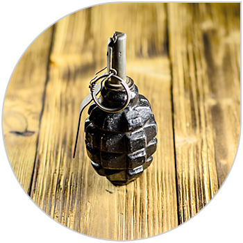 Grenade resting on a table