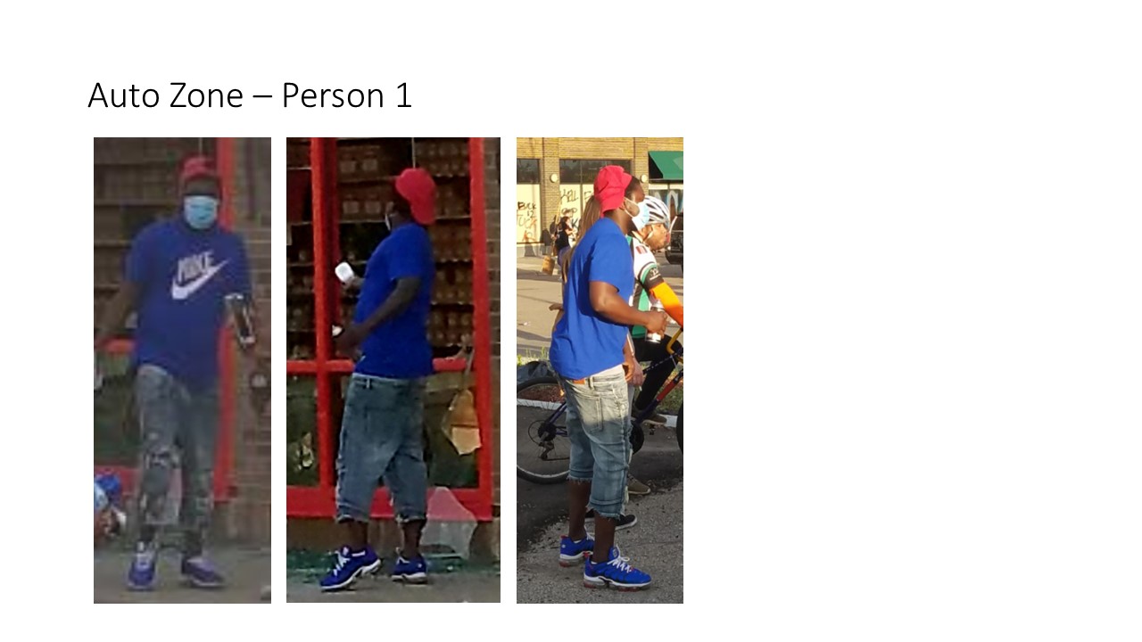 A man in a blue Nike t-shirt, grey jean capris and a red baseball cap.