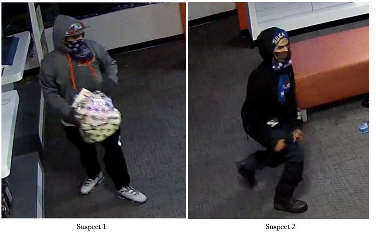 Two suspects captured on surveillance footage at Tulas shopping center the night of the fire.