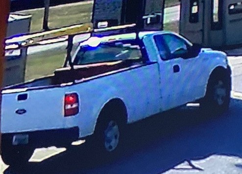 White Ford truck stopped on Cairo Road