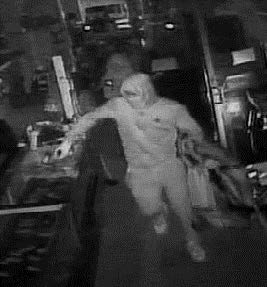 Suspect breaking glass display