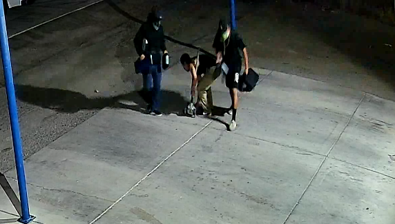 Three suspects holding stolen property