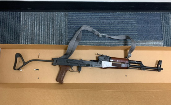 Stolen brown rifle with handle
