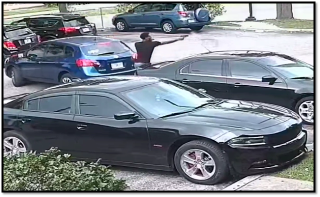 Suspect with arm extended and firearm in hand