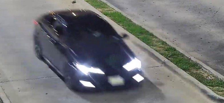 Black car leaving scene of crime
