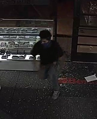 Masked man inside store