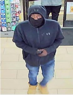 Suspect in blue hoodie