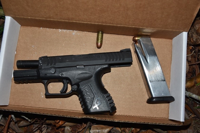 A firearm.