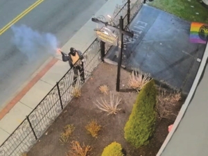 Suspect holding an IED