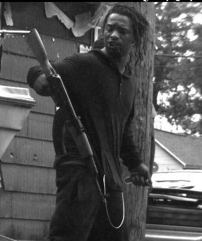 Suspect holding an AK-47 style weapon