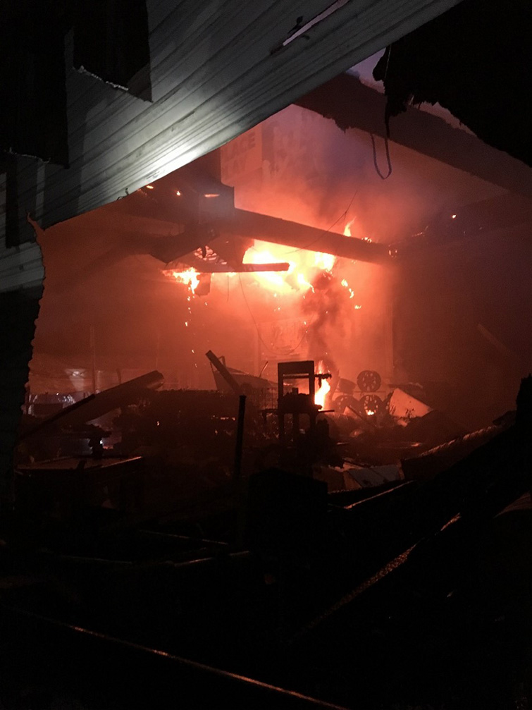 Flames tear through the Off Road Warehouse.
