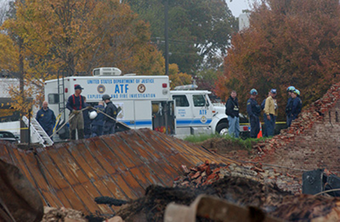 ATF agents at working an investigation at an arson site
