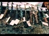 Firearms retrieved from the Mount Carmel compound and tagged as evidence.