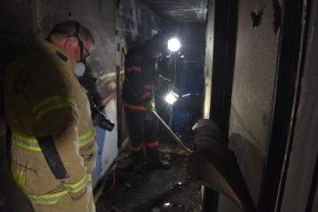 Certified Fire Investigators conducting a fire exercise during training